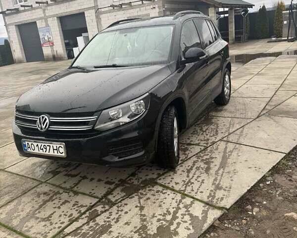 Чорний Фольксваген Тігуан, об'ємом двигуна 1.98 л та пробігом 248 тис. км за 12500 $, фото 1 на Automoto.ua
