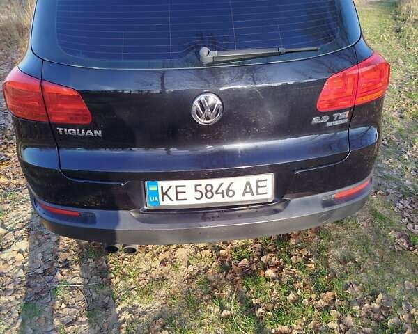 Черный Фольксваген Тигуан, объемом двигателя 1.98 л и пробегом 190 тыс. км за 12700 $, фото 1 на Automoto.ua