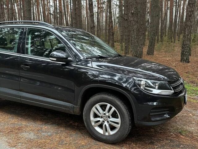 Черный Фольксваген Тигуан, объемом двигателя 2 л и пробегом 240 тыс. км за 12200 $, фото 2 на Automoto.ua