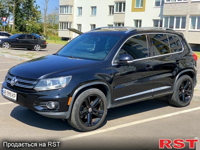 Черный Фольксваген Тигуан, объемом двигателя 2 л и пробегом 230 тыс. км за 12000 $, фото 1 на Automoto.ua