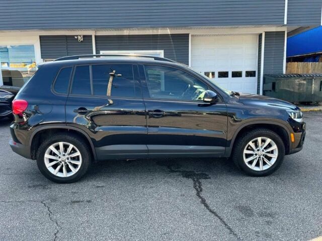 Чорний Фольксваген Тігуан, об'ємом двигуна 2 л та пробігом 74 тис. км за 4800 $, фото 5 на Automoto.ua