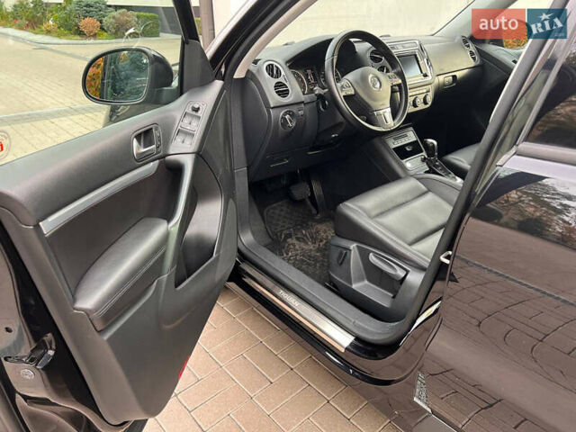 Чорний Фольксваген Тігуан, об'ємом двигуна 1.98 л та пробігом 174 тис. км за 12750 $, фото 24 на Automoto.ua