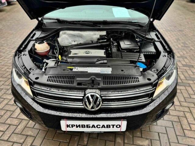 Черный Фольксваген Тигуан, объемом двигателя 2 л и пробегом 99 тыс. км за 13600 $, фото 2 на Automoto.ua