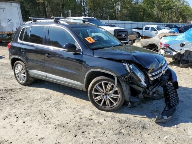 Черный Фольксваген Тигуан, объемом двигателя 2 л и пробегом 206 тыс. км за 7700 $, фото 2 на Automoto.ua