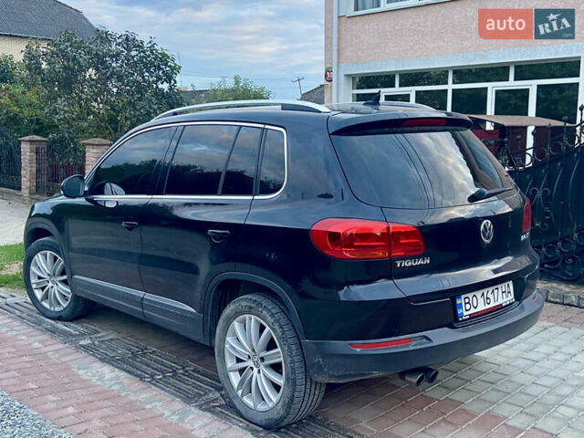 Черный Фольксваген Тигуан, объемом двигателя 1.98 л и пробегом 155 тыс. км за 12800 $, фото 1 на Automoto.ua