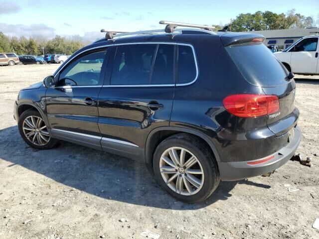 Черный Фольксваген Тигуан, объемом двигателя 2 л и пробегом 206 тыс. км за 7700 $, фото 3 на Automoto.ua