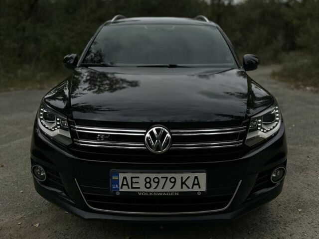 Чорний Фольксваген Тігуан, об'ємом двигуна 2 л та пробігом 97 тис. км за 20500 $, фото 2 на Automoto.ua