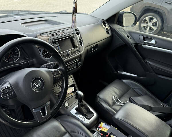 Черный Фольксваген Тигуан, объемом двигателя 2 л и пробегом 166 тыс. км за 16400 $, фото 3 на Automoto.ua