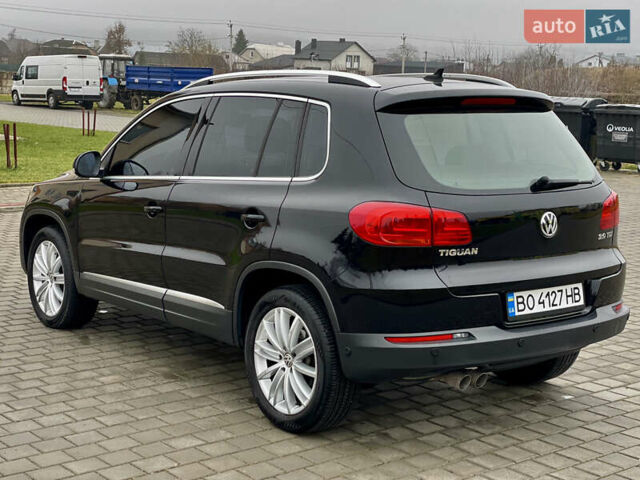 Чорний Фольксваген Тігуан, об'ємом двигуна 2 л та пробігом 223 тис. км за 16950 $, фото 28 на Automoto.ua