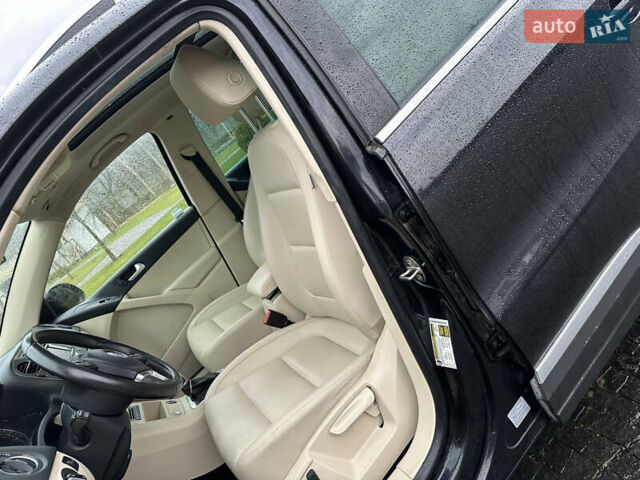 Черный Фольксваген Тигуан, объемом двигателя 1.98 л и пробегом 143 тыс. км за 12400 $, фото 20 на Automoto.ua