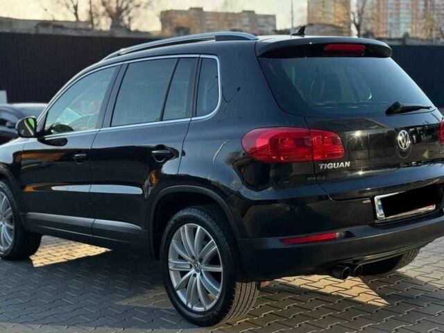 Черный Фольксваген Тигуан, объемом двигателя 2 л и пробегом 151 тыс. км за 9500 $, фото 2 на Automoto.ua