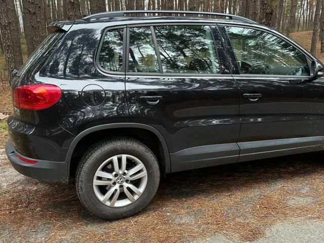 Черный Фольксваген Тигуан, объемом двигателя 2 л и пробегом 240 тыс. км за 12200 $, фото 4 на Automoto.ua