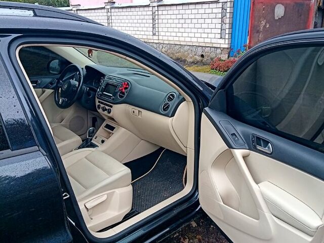 Чорний Фольксваген Тігуан, об'ємом двигуна 2 л та пробігом 145 тис. км за 11500 $, фото 13 на Automoto.ua