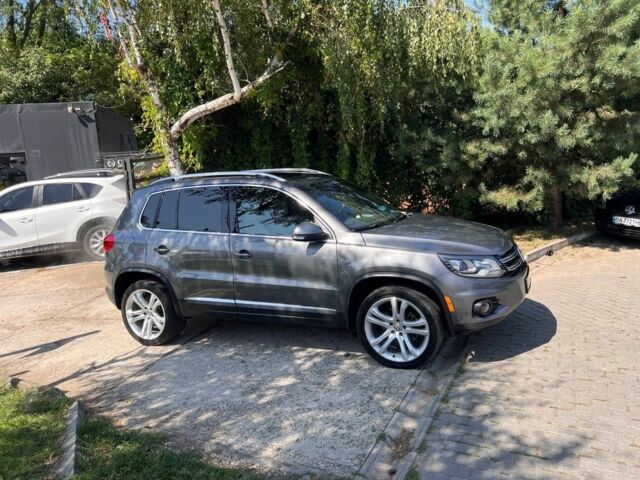 Черный Фольксваген Тигуан, объемом двигателя 1.8 л и пробегом 170 тыс. км за 12700 $, фото 2 на Automoto.ua