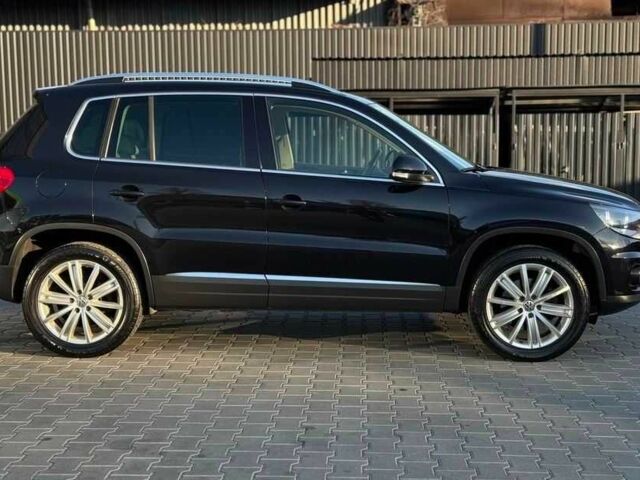 Черный Фольксваген Тигуан, объемом двигателя 2 л и пробегом 151 тыс. км за 9500 $, фото 1 на Automoto.ua