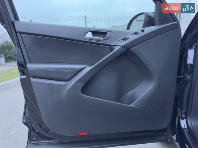 Черный Фольксваген Тигуан, объемом двигателя 1.98 л и пробегом 180 тыс. км за 11800 $, фото 27 на Automoto.ua