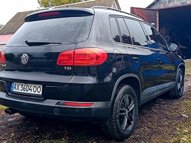 Чорний Фольксваген Тігуан, об'ємом двигуна 2 л та пробігом 145 тис. км за 11500 $, фото 4 на Automoto.ua