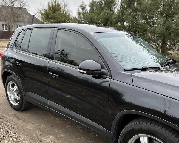 Черный Фольксваген Тигуан, объемом двигателя 1.98 л и пробегом 180 тыс. км за 12800 $, фото 2 на Automoto.ua