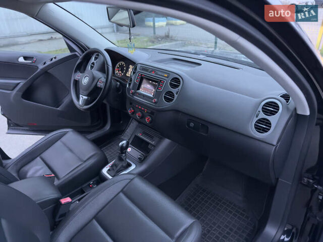 Черный Фольксваген Тигуан, объемом двигателя 1.98 л и пробегом 180 тыс. км за 11800 $, фото 42 на Automoto.ua