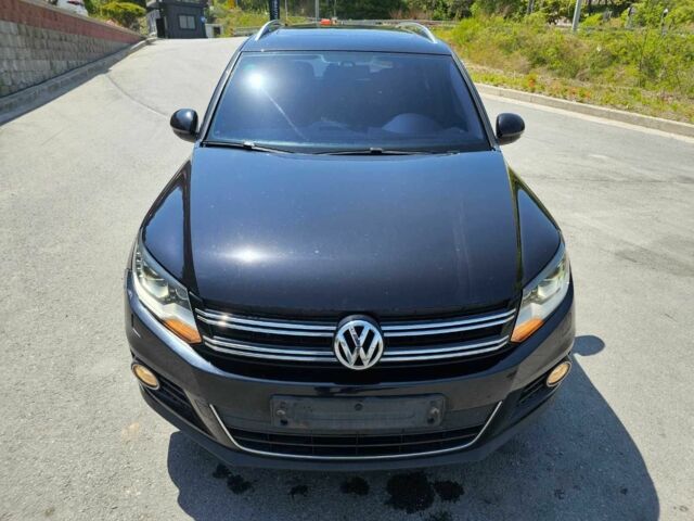 Чорний Фольксваген Тігуан, об'ємом двигуна 2 л та пробігом 125 тис. км за 3850 $, фото 2 на Automoto.ua