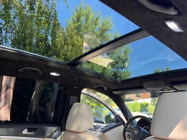 Черный Фольксваген Тигуан, объемом двигателя 1.8 л и пробегом 170 тыс. км за 12700 $, фото 7 на Automoto.ua