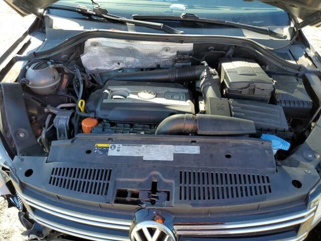 Черный Фольксваген Тигуан, объемом двигателя 2 л и пробегом 206 тыс. км за 7700 $, фото 10 на Automoto.ua