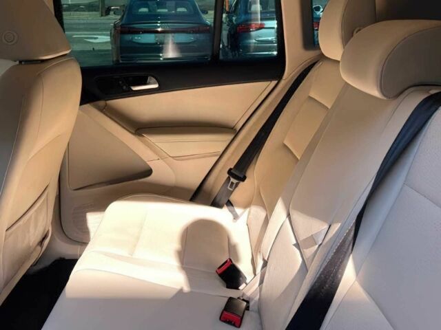 Чорний Фольксваген Тігуан, об'ємом двигуна 2 л та пробігом 74 тис. км за 4800 $, фото 12 на Automoto.ua