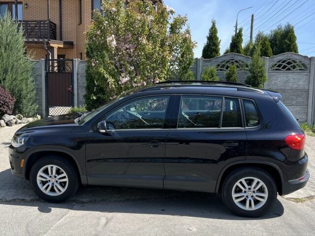 Черный Фольксваген Тигуан, объемом двигателя 2 л и пробегом 258 тыс. км за 13300 $, фото 2 на Automoto.ua