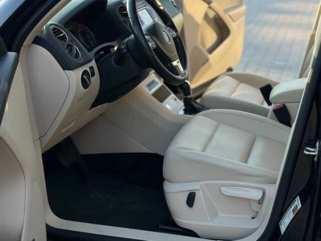 Черный Фольксваген Тигуан, объемом двигателя 2 л и пробегом 151 тыс. км за 9500 $, фото 4 на Automoto.ua