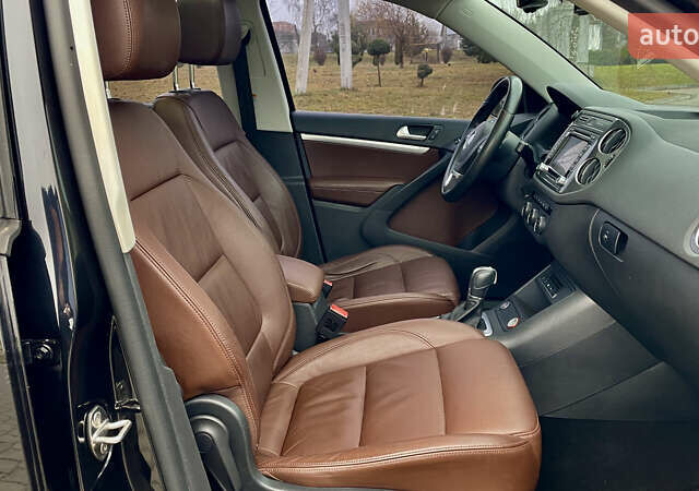 Чорний Фольксваген Тігуан, об'ємом двигуна 2 л та пробігом 223 тис. км за 16950 $, фото 41 на Automoto.ua