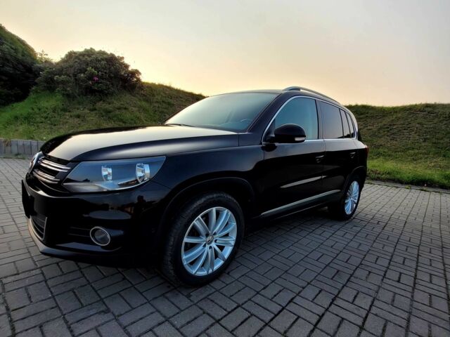 Черный Фольксваген Тигуан, объемом двигателя 2 л и пробегом 75 тыс. км за 7900 $, фото 2 на Automoto.ua