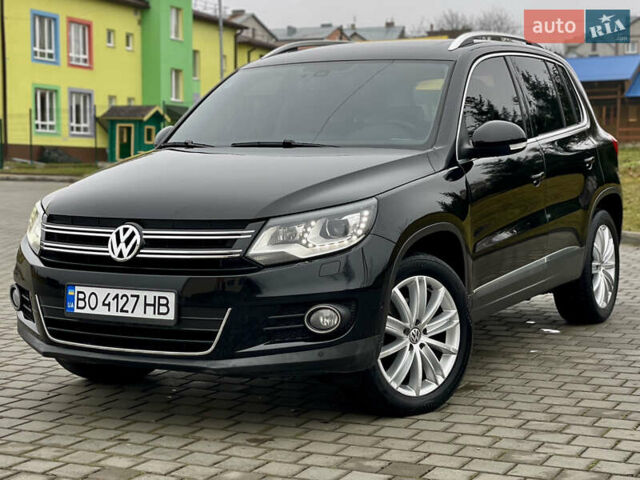 Чорний Фольксваген Тігуан, об'ємом двигуна 2 л та пробігом 223 тис. км за 16950 $, фото 1 на Automoto.ua