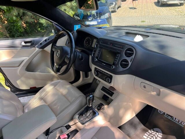 Черный Фольксваген Тигуан, объемом двигателя 1.8 л и пробегом 170 тыс. км за 12700 $, фото 9 на Automoto.ua