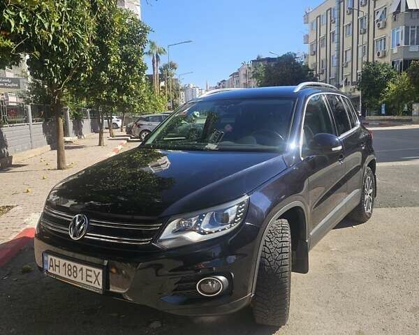 Черный Фольксваген Тигуан, объемом двигателя 2 л и пробегом 201 тыс. км за 14000 $, фото 4 на Automoto.ua