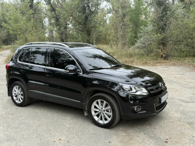 Чорний Фольксваген Тігуан, об'ємом двигуна 2 л та пробігом 97 тис. км за 20500 $, фото 1 на Automoto.ua