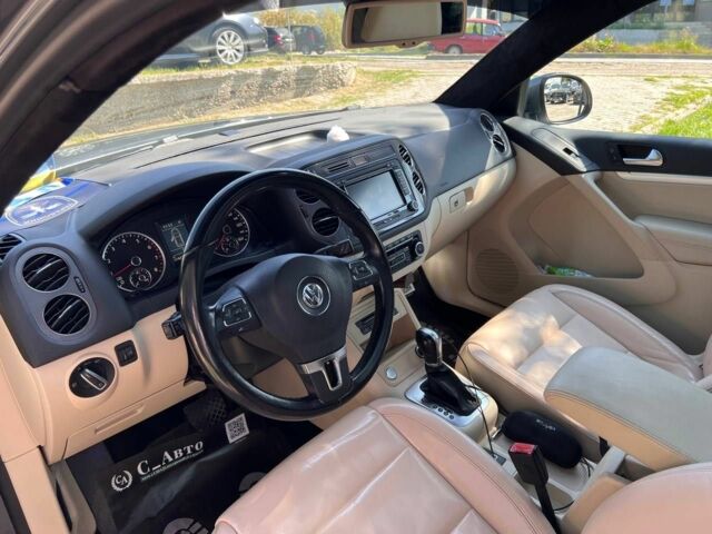 Черный Фольксваген Тигуан, объемом двигателя 1.8 л и пробегом 170 тыс. км за 12700 $, фото 14 на Automoto.ua