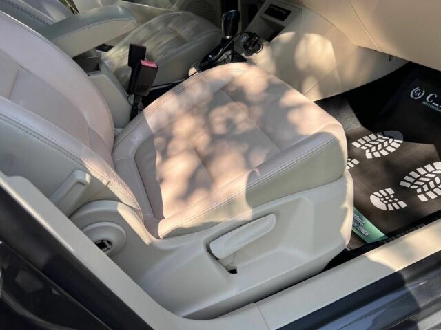 Черный Фольксваген Тигуан, объемом двигателя 1.8 л и пробегом 170 тыс. км за 12700 $, фото 11 на Automoto.ua