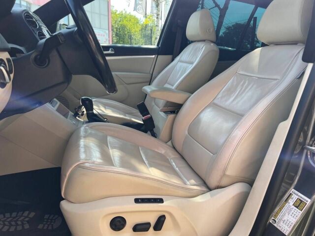 Черный Фольксваген Тигуан, объемом двигателя 1.8 л и пробегом 170 тыс. км за 12700 $, фото 15 на Automoto.ua