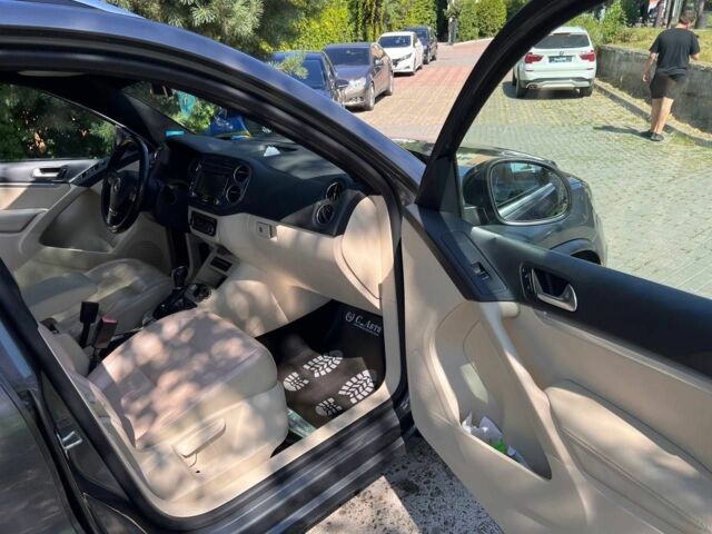 Черный Фольксваген Тигуан, объемом двигателя 1.8 л и пробегом 170 тыс. км за 12700 $, фото 12 на Automoto.ua