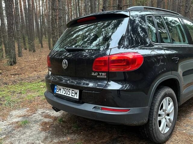Черный Фольксваген Тигуан, объемом двигателя 2 л и пробегом 240 тыс. км за 12200 $, фото 1 на Automoto.ua