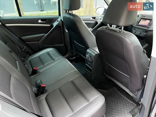 Чорний Фольксваген Тігуан, об'ємом двигуна 1.98 л та пробігом 174 тис. км за 12750 $, фото 89 на Automoto.ua