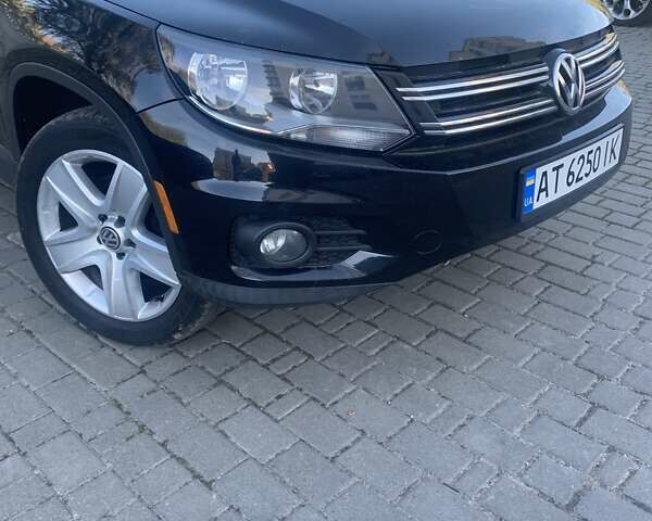 Черный Фольксваген Тигуан, объемом двигателя 1.98 л и пробегом 147 тыс. км за 13750 $, фото 1 на Automoto.ua