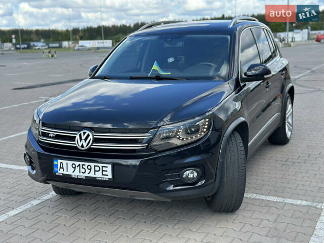 Чорний Фольксваген Тігуан, об'ємом двигуна 1.98 л та пробігом 180 тис. км за 14600 $, фото 1 на Automoto.ua