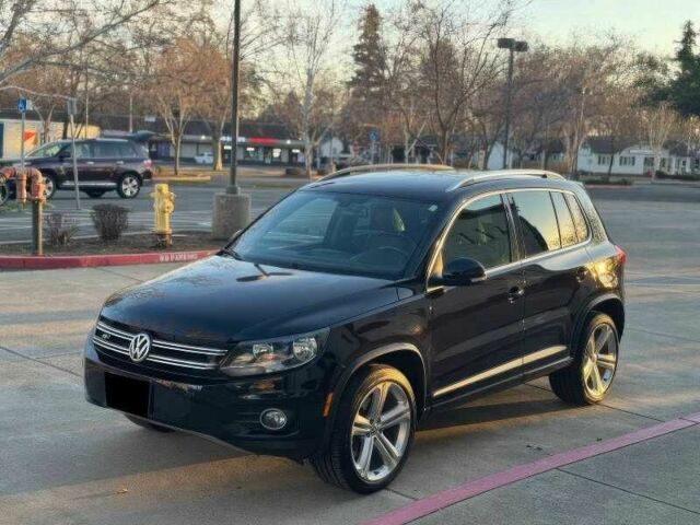 Черный Фольксваген Тигуан, объемом двигателя 2 л и пробегом 112 тыс. км за 7800 $, фото 2 на Automoto.ua
