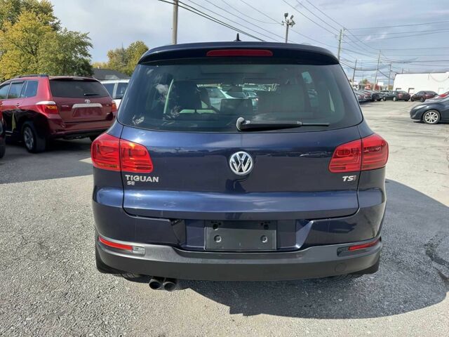 Чорний Фольксваген Тігуан, об'ємом двигуна 2 л та пробігом 80 тис. км за 5800 $, фото 5 на Automoto.ua