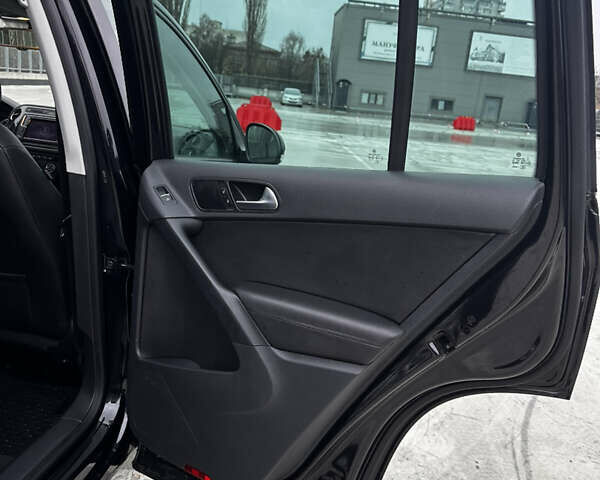 Черный Фольксваген Тигуан, объемом двигателя 1.98 л и пробегом 164 тыс. км за 12999 $, фото 25 на Automoto.ua