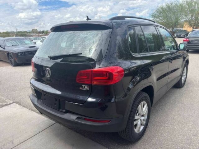 Черный Фольксваген Тигуан, объемом двигателя 2 л и пробегом 77 тыс. км за 3400 $, фото 5 на Automoto.ua