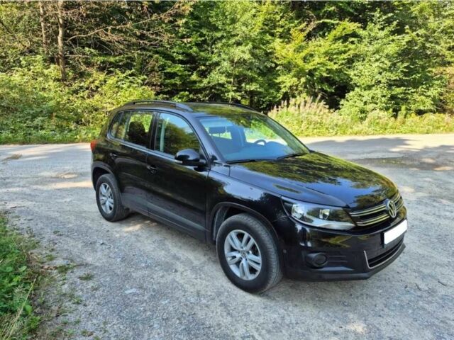 Черный Фольксваген Тигуан, объемом двигателя 2 л и пробегом 156 тыс. км за 8200 $, фото 1 на Automoto.ua