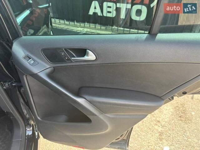 Чорний Фольксваген Тігуан, об'ємом двигуна 1.98 л та пробігом 180 тис. км за 14500 $, фото 4 на Automoto.ua