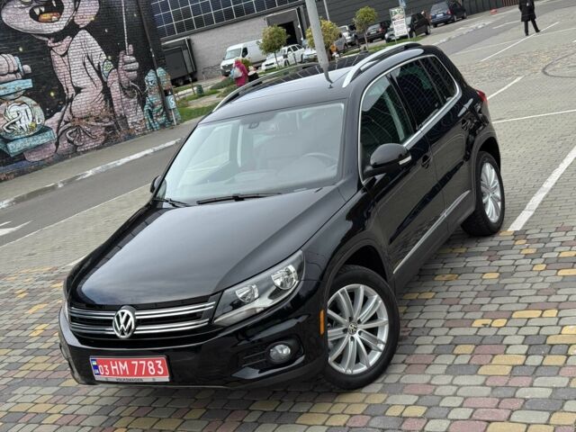 Чорний Фольксваген Тігуан, об'ємом двигуна 2 л та пробігом 157 тис. км за 13499 $, фото 1 на Automoto.ua